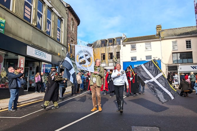 St Piran's flag is proudly flown at the head of the parade (Image - Penzance Council).jpg