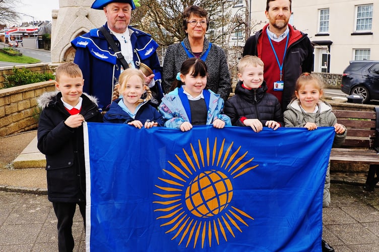 Mike Pearn MBE (Town Crier), Cllr Julie Martin (Deputy Town Mayor), Isla, Owen, and Charlie. Photograph: Andy Campfield