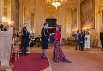 Nurse collects her MBE from the Princess Royal