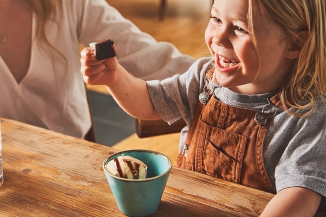 Children have the chance to create a new dessert.