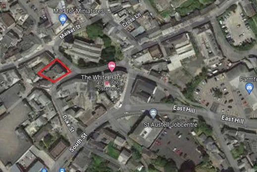 The red outline shows the site of the former bank.
