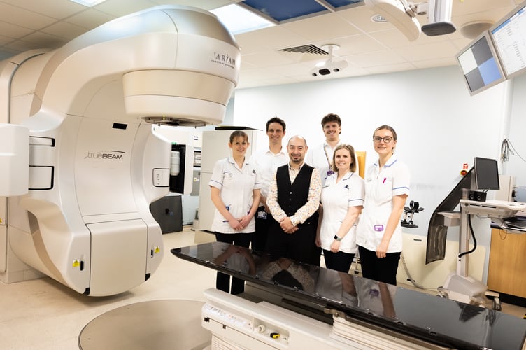 Senior Radiographer Nikki Snell, Clinical Oncologist Dr John McGrane, Head of Radiotherapy Physics Savvas Rizkalla, Medical Physicist John King, Operational Lead Zoe Rowett and Senior Radiographer Charlotte Mcalinden with the new equipment