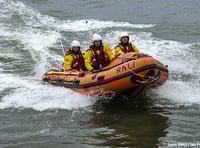 Walkers rescued after rising tide cuts them off