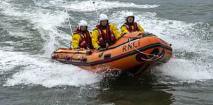 Walkers rescued after rising tide cuts them off