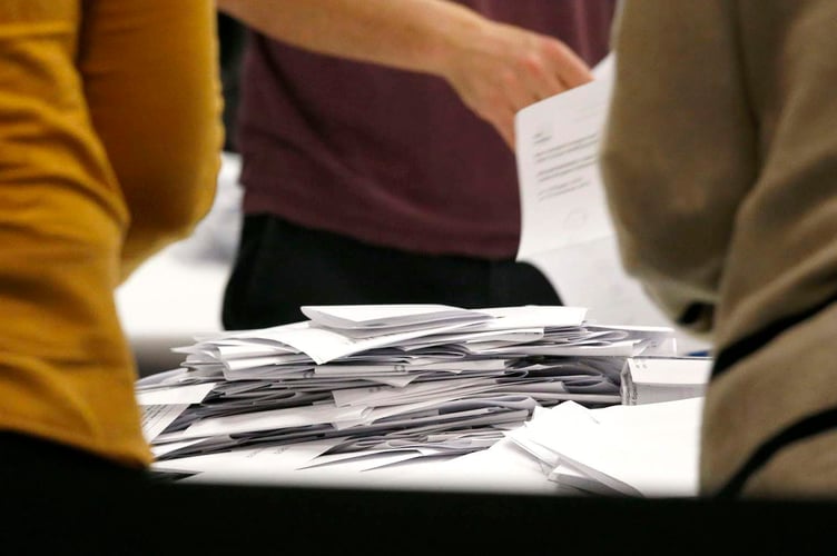 AB1912 ELECTIONNIGHT82 PHOTO CODE 19DPJ19DEC82 - PHOTO DAVID ARWYN PARRY JONES / CAMBRIAN NEWS PRESS PHOTOGRAPHER - 19DECEMBER2019 - REF Dylan/Antony; Ref Karl/Dylan; General Election Count at Aberaeron December 12th 2019  - 