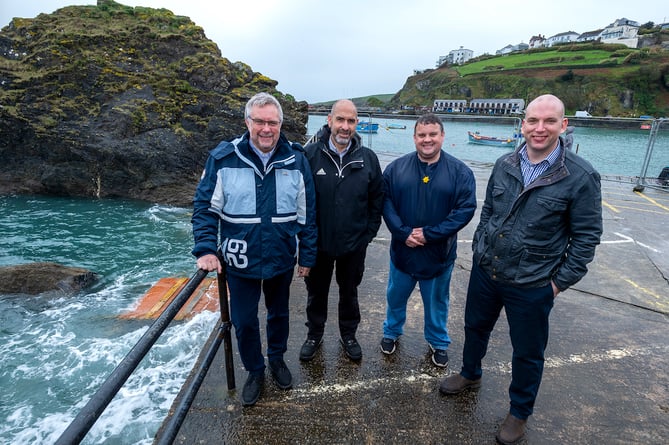MP Steve Double, Mevagissey harbourmaster Andrew Trevarton and Cornwall Councillors James Mustoe and Louis Gardner.