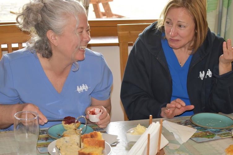 Members of the team at Little Harbour enjoying a cream tea with jam first.