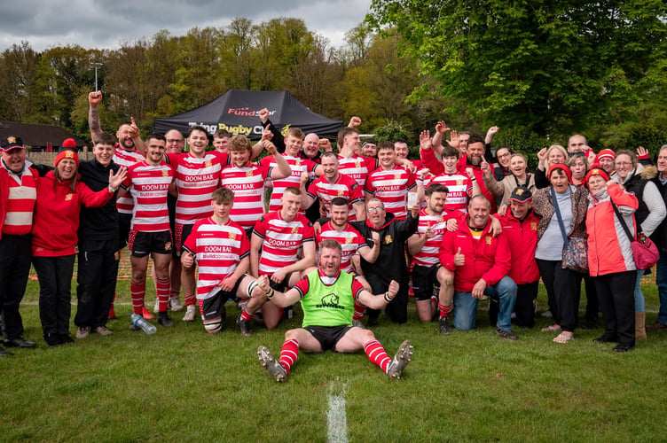 St Austell's players and supporters celebrate their victory at Tring on Saturday.