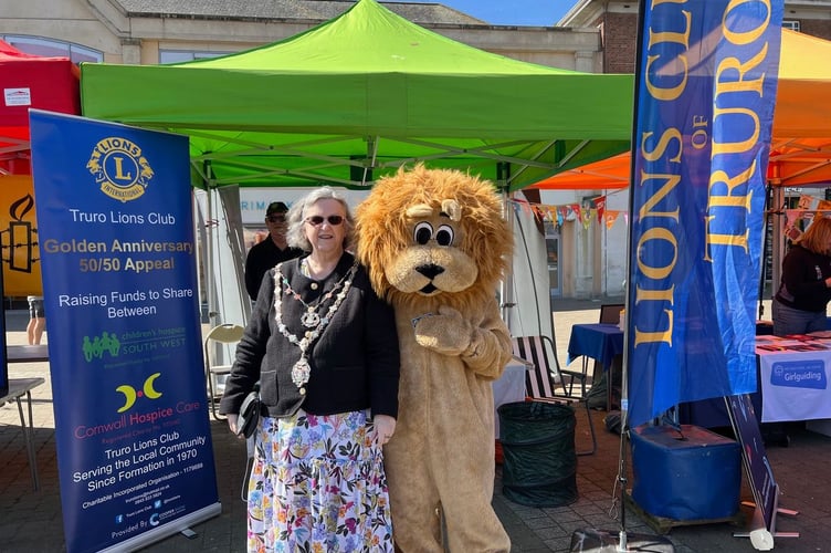 Truro mayor Cllr Carol Swain and the Truro Lions mascot at Truro Volunteers Day
