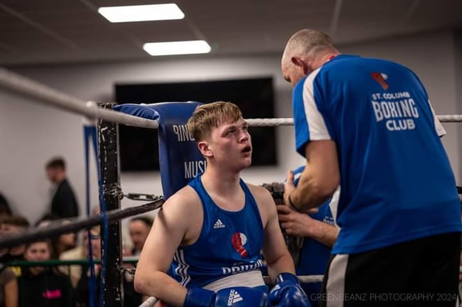 St Columb coach Paul Doust speaks to Max Brownnig between rounds
