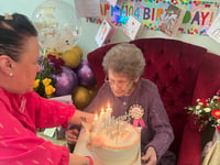 Dog-lover Beryl celebrates her 104th birthday at care home