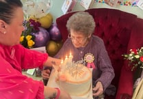 Dog-lover Beryl celebrates her 104th birthday at care home