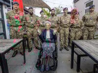 Former servicewoman given surprise at her 102nd birthday party