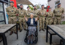 Former servicewoman given surprise at her 102nd birthday party