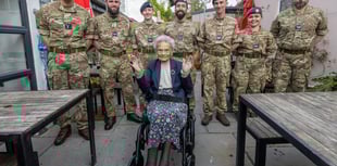 Former servicewoman given surprise at her 102nd birthday party