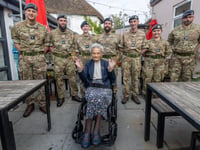 Former servicewoman given surprise at her 102nd birthday party
