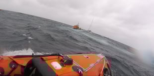 RNLI lifeguards and lifeboat crews rescue yacht in difficulty 