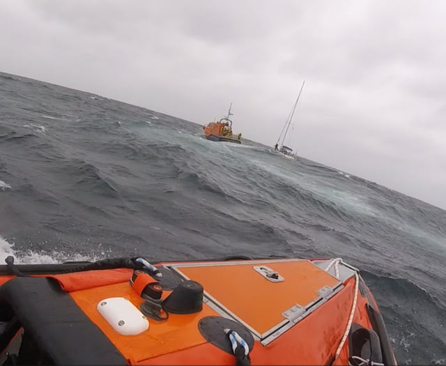 RNLI lifeguards and lifeboat crews rescue yacht in difficulty 