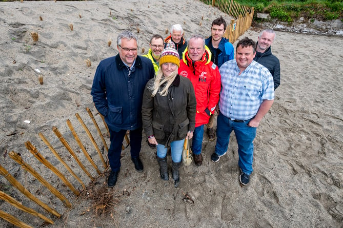 Among those who gathered to mark the completion of the project were Pentewan Valley councillors Mike Ward, Toni Dowrick and Miles Avery, MP Steve Double, Bryan Skinner of Cornwall Council, Grant Young of the Environment Agency, Cllr James Mustoe and Rob Brewer of St Austell Brewery. Picture: Paul Williams