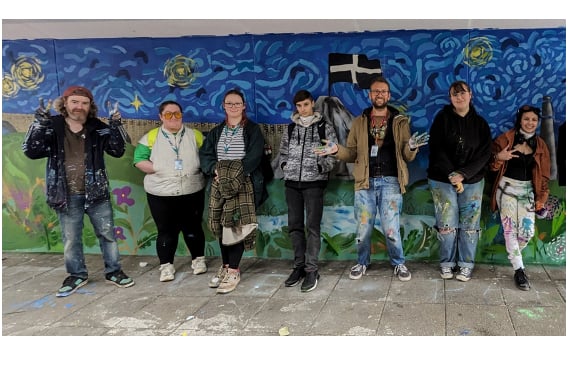 James Baggaley with some of those who worked on the mural project in St Austell.