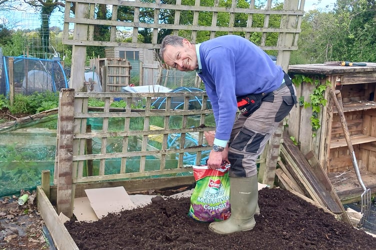 Martin Pallett working at the allotment.