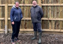 Firm helps out forest school after two trees have to be felled