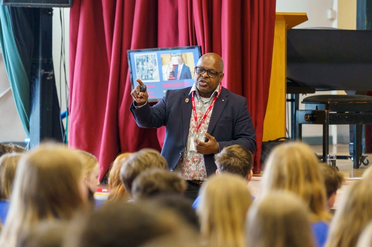 Floyd Steadman OBE addresses students at the Roseland Academy