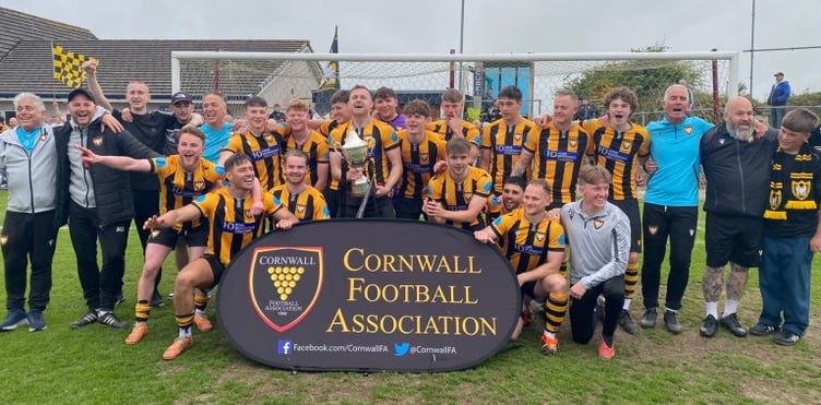 Falmouth Town celebrate winning the Cornwall Senior Cup at Wendron United back in May after defeating St Austell. Picture: Kevin Marriott