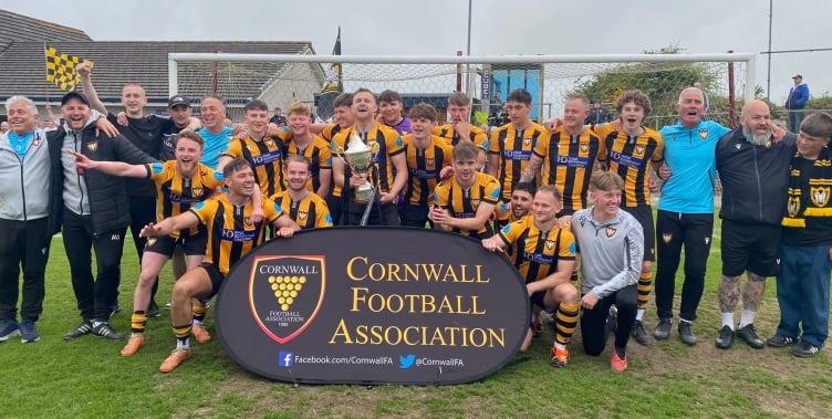 Falmouth Town celebrate winning the Cornwall Senior Cup at Wendron United back in May after defeating St Austell. Picture: Kevin Marriott