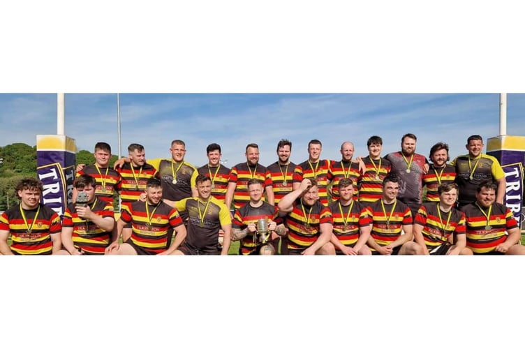 Saltash celebrate winning the Cornwall Clubs Cup at Polson Bridge.
