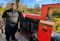 Rail attraction converts battery-powered locomotive 