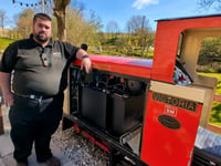 Rail attraction converts battery-powered locomotive 
