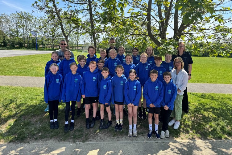 The students with their hooded tops