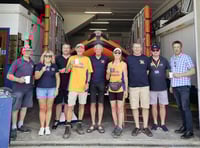 Couple walking the British coastline in aid of the RNLI visit Newquay 