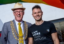 Pride parade takes to the sunny streets of town