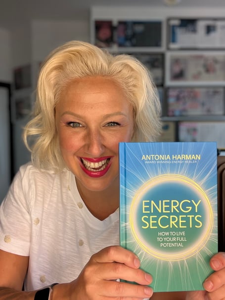 Antonia Harman, 43, with her book 'Energy Secrets'. Meet the real life wizard who claims she can "cure depression" by tuning into someones emotions and "reverse ageing" by increasing her cell voltage. Antonia Harman, 43, used to work as a TV presenter before completing a healing course - during which "opened her eyes" to the world of healing. She said that people "don't understand" when she says she is a wizard but she stands by it and explains her role. Antonia says she's spent the last 20 years in a "trance like state" - which enables her to tune into her "healing powers". She claims she can dissolve trauma and even heal physical ailments like cysts, tumours and arthritis. Over the years, Antonia has cured Diane Vickers tonsilitis and helped Lizzie Cundy with "emotional trauma".