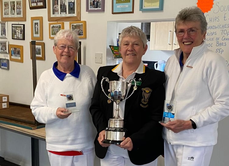 The cup winners Christine Timmins (Looe) and Val Reilly (Looe) seen here being presented with the cup by Mandy Kellow (middle), vice-chairman of Group Three.