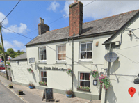 Pub evacuated after two caravans caught fire