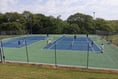 School pupils enjoy playing at tennis club