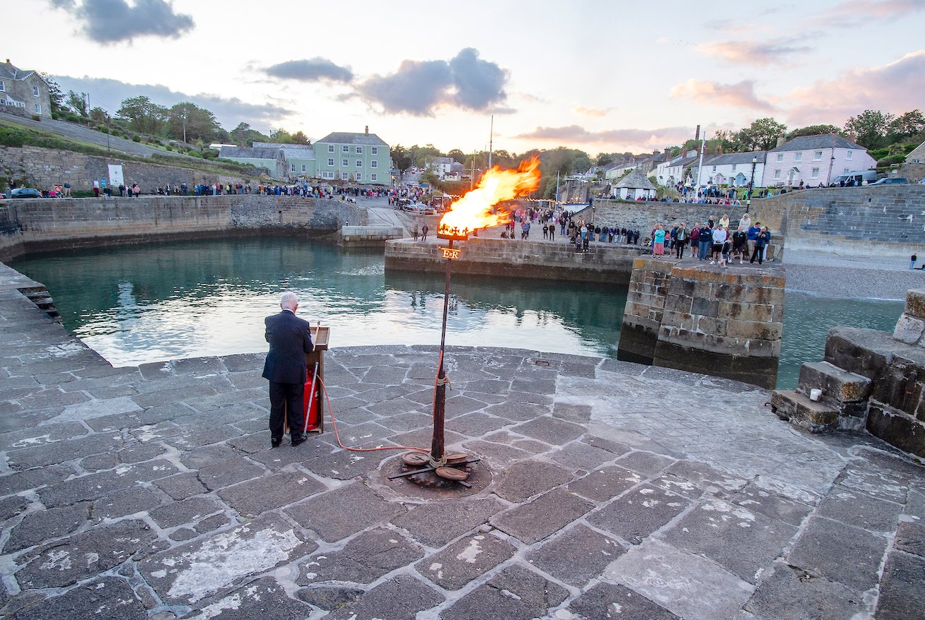 Beacon lit beside the sea at Charlestown to mark 80th anniversary of DDay voicenewspapers.co.uk