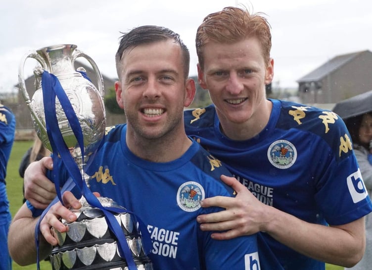 Rikki Shepherd (right) pictured celebrating winning the Western League Premier Division title last season with Helston Athletic last season, is struggling for fitness. Picture: Helston Athletic AFC