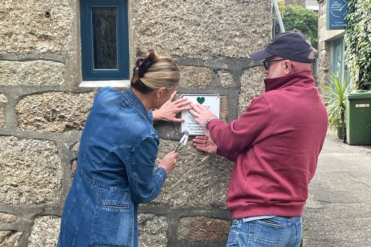 2024 Mounting new sign - Esme Page + George Robinson - Cornwall Hugs