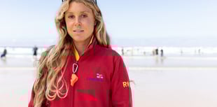 Lifeguards jump in fully clothed to save bodyboarder