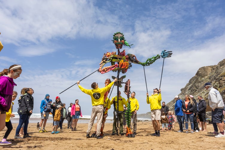 Wildcard - Arts On The Beach event at Watergate Bay. A free family weekend of whale theatre, aerial performance, a 13-foot roaming puppet, dance, music and creative workshops. The second Arts on the Beach event following its inauguration last year. Newquay, Cornwall. June 15 2024.