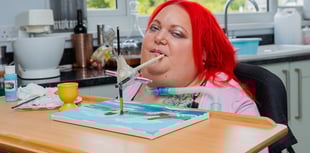 Paralysed woman overcame the odds to paint with her mouth