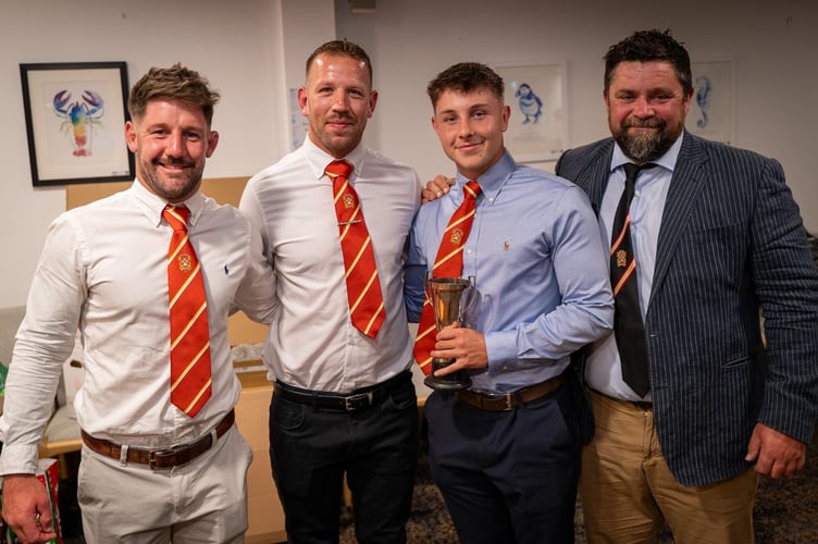 Cam Taylor receiving his Player of the Year award. From left: Matt Shepherd (attack coach and now head coach), Sam Parsons (defence coach), Cam Taylor and Neil Bayliss (forwards coach). Picture: Graham Walker
