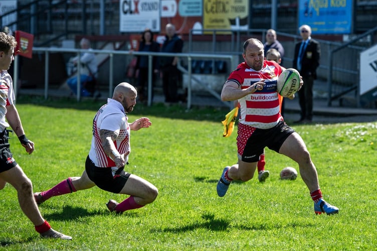 Garry Hooper, pictured on the ball, was the standout player for St Austell Thirds, better known as the Spartans during their campaign.