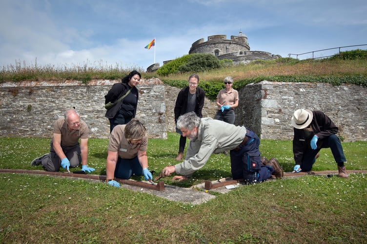 English Heritage volunteers are trained in the conservation of iron
