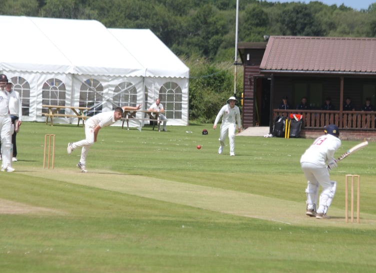 Werrington paceman Sam Hockin, pictured bowling on Saturday, took three key wickets against Penzance. Picture: Paul Hamlyn