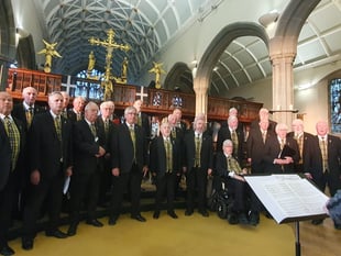 Choir and brass band join forces to raise funds